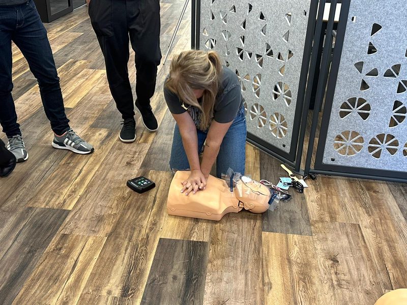 Learners practising CPR on a manikin in Manchester